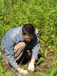 [Photo: Prairie Planting Volunteer]