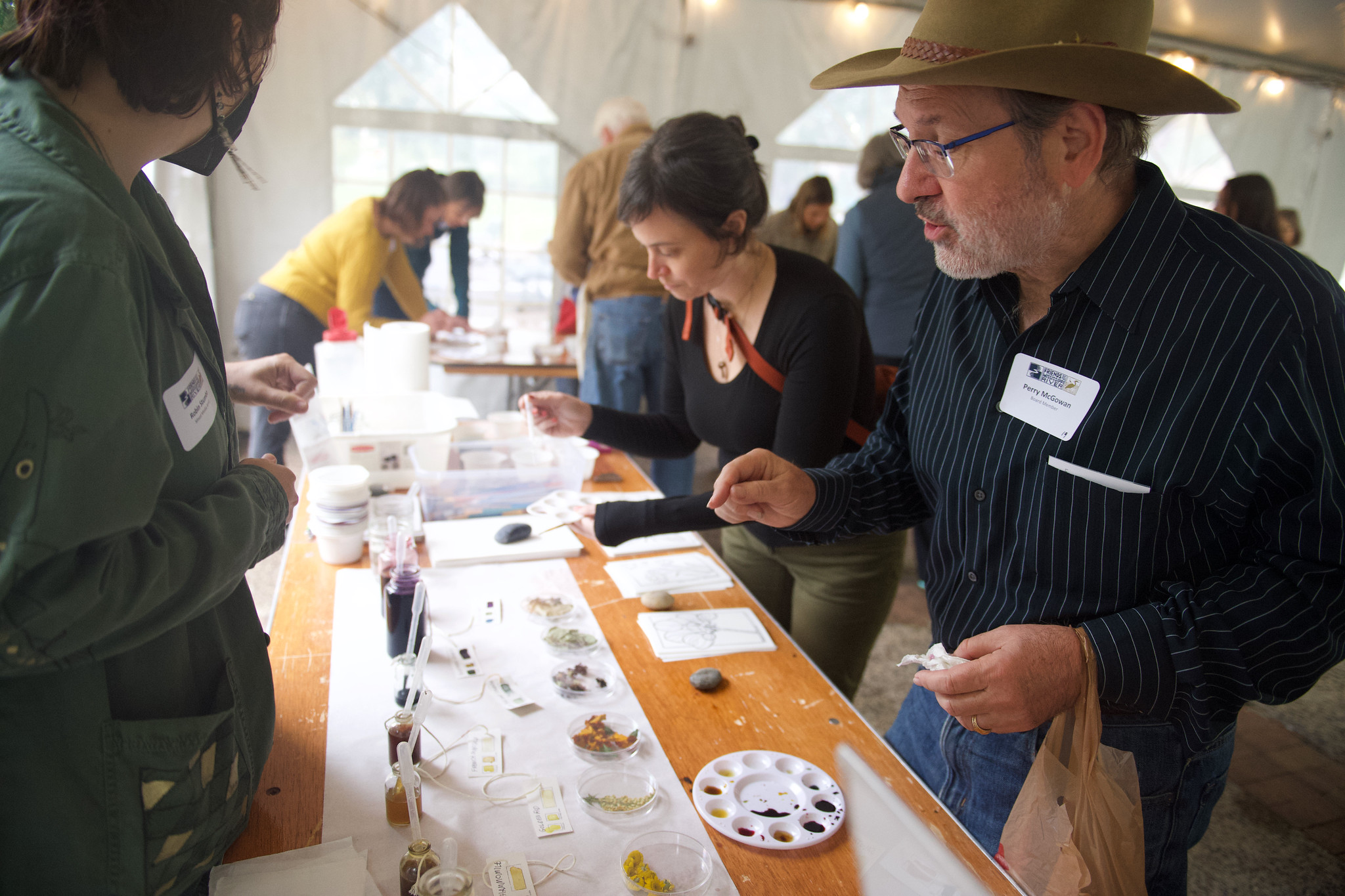 Guests at the art experience table