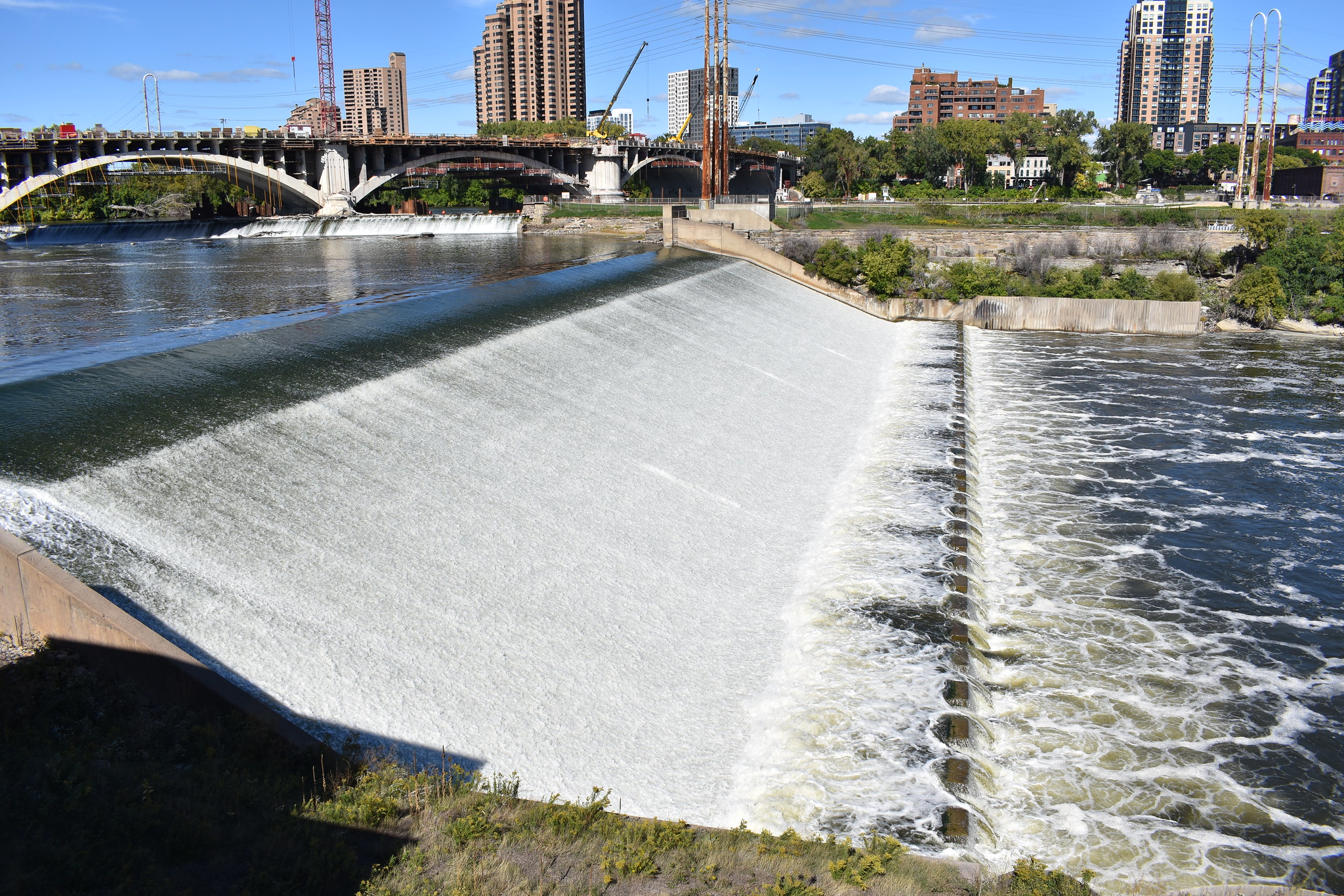 Water flows over Owamniyomni, also known as St. Anthony Falls