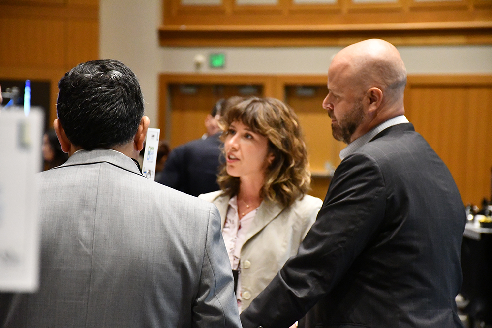 FMR's Meghan Anderson and Trevor Russell speaking to attendees at the SAF Conference.