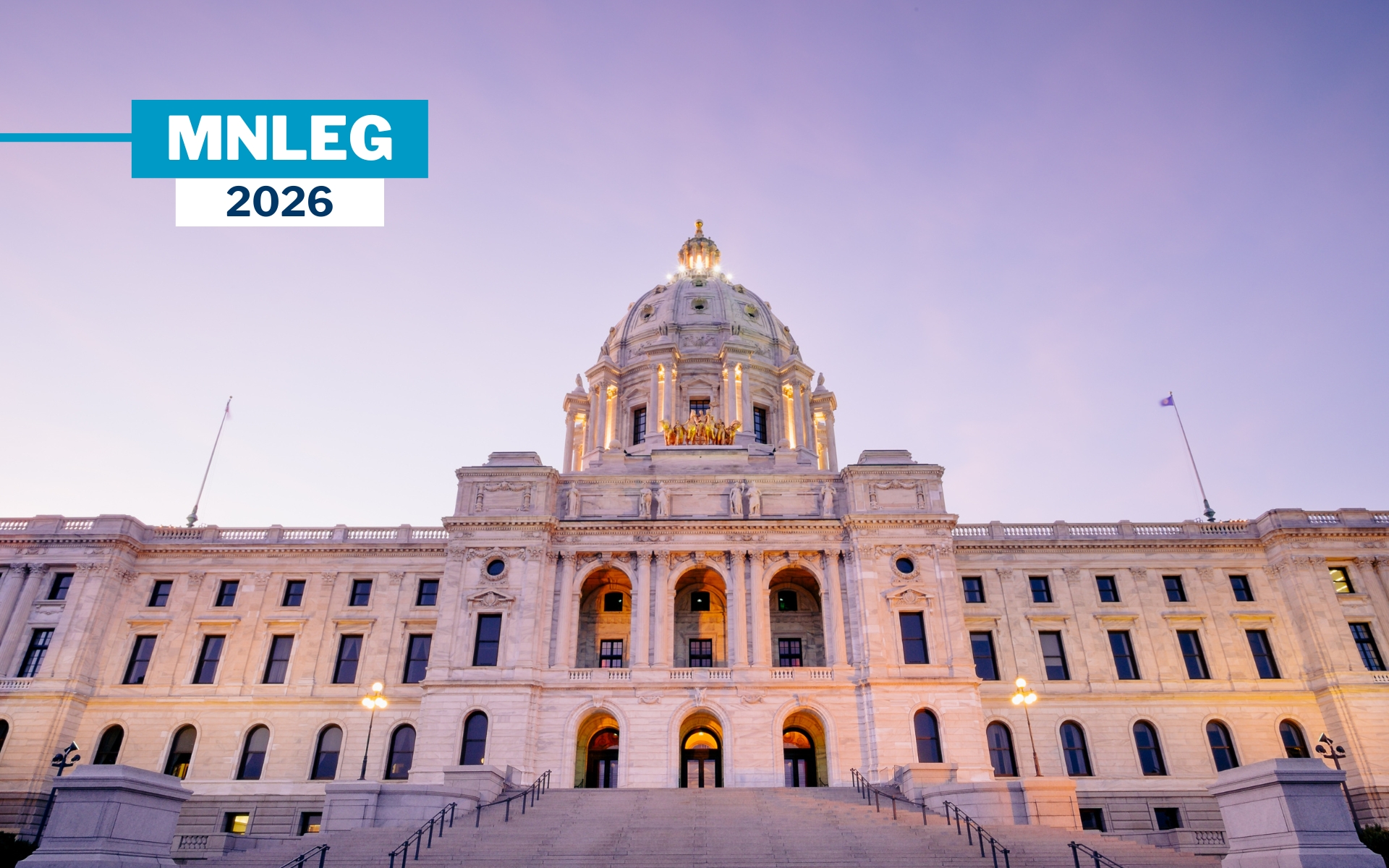 The Minnesota Capitol building in front of a purple evening sky.