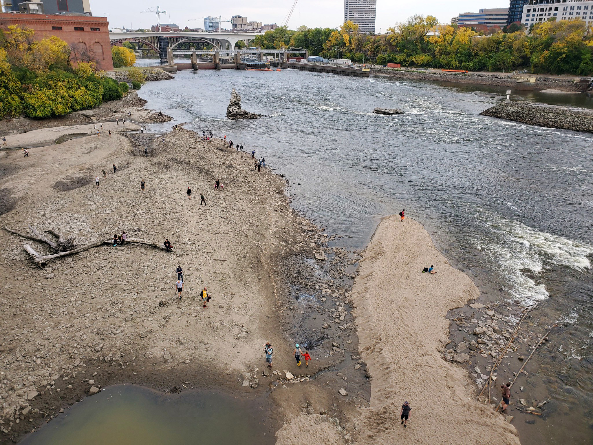 Mississippi with people walking on partially exposed riverbed