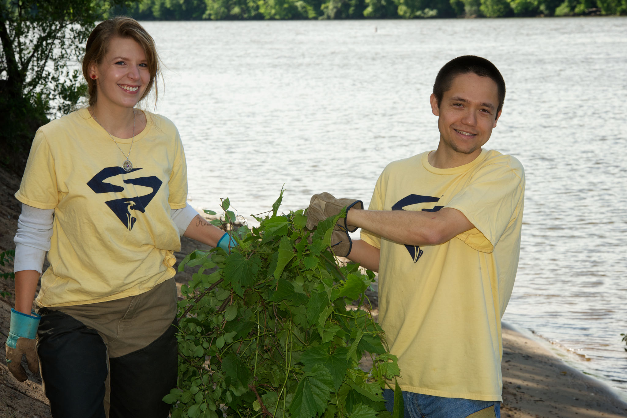 Stacy and Allan help clean up the riverfront and remove some invasive plants while they're there.