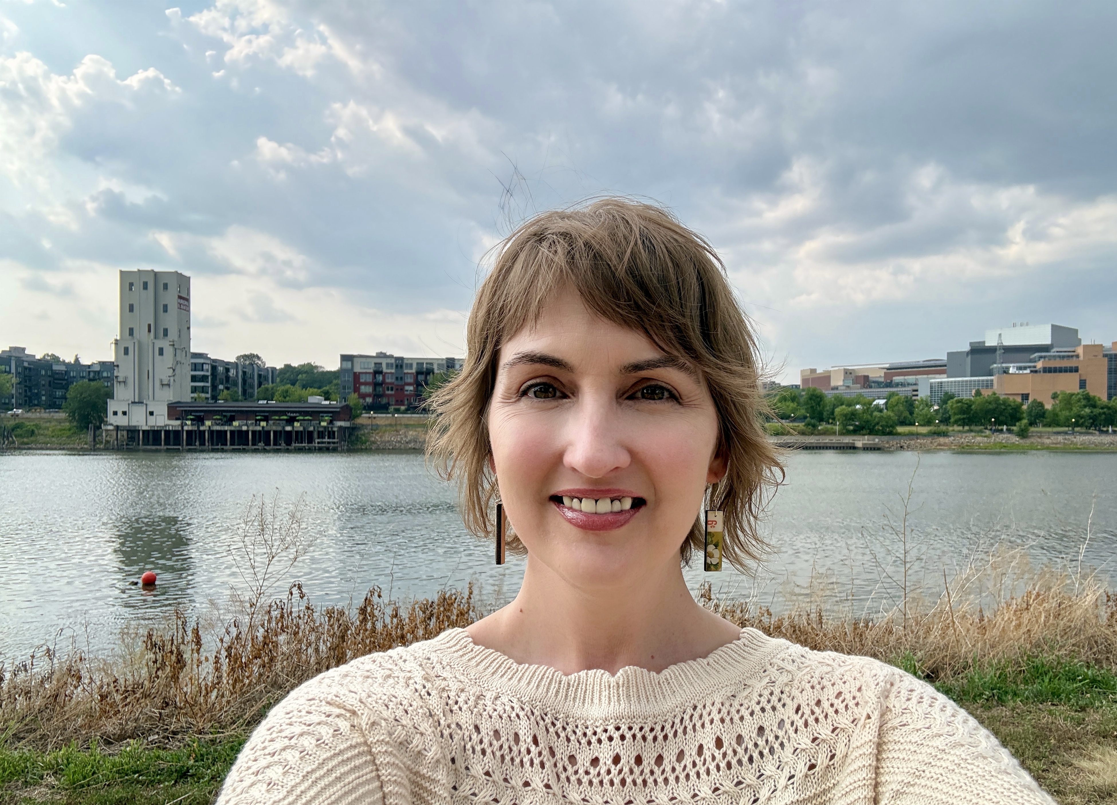Corrie in front of the Mississippi River at Harriet Island