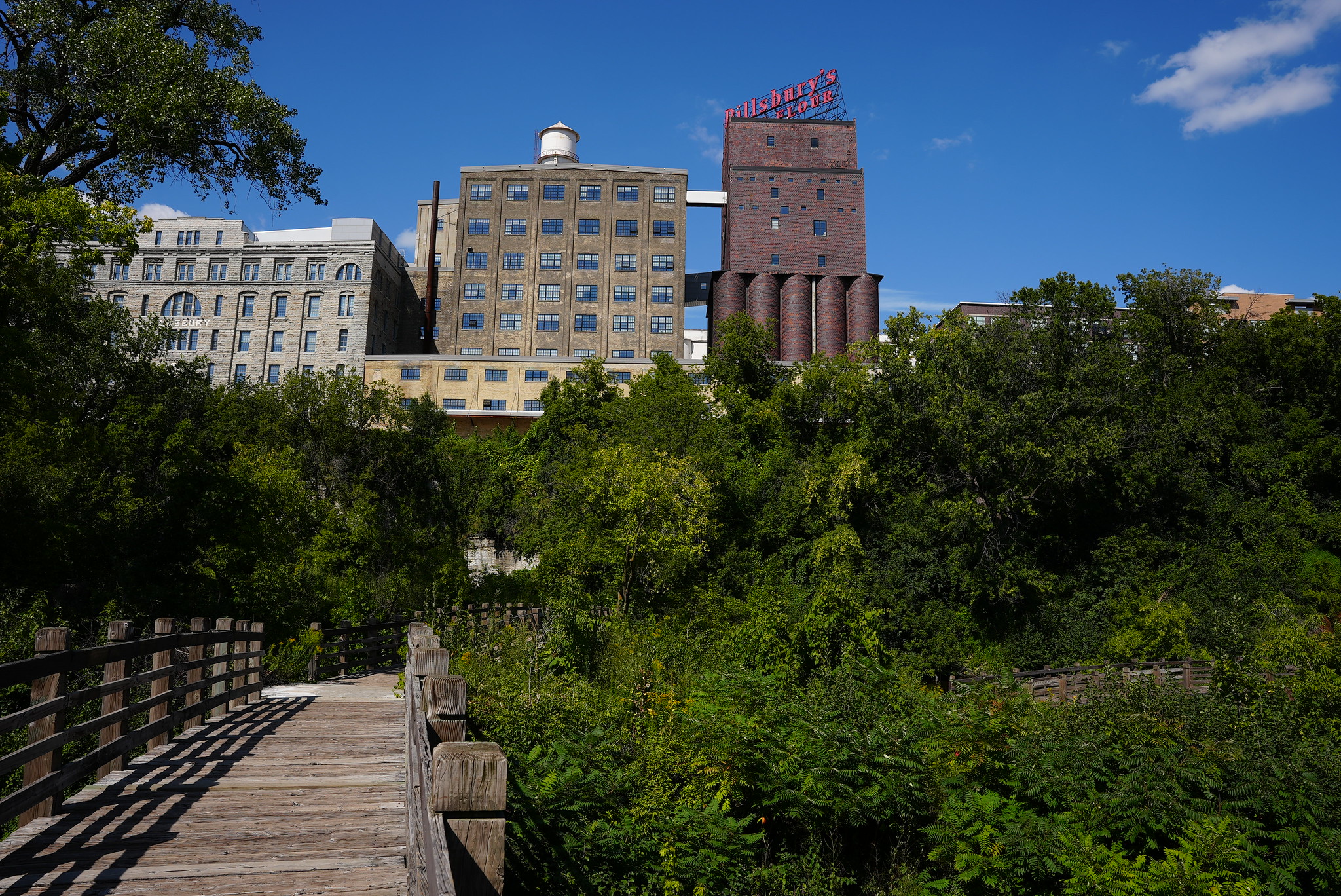 Father Hennepin Bluff Park bridge below buildings