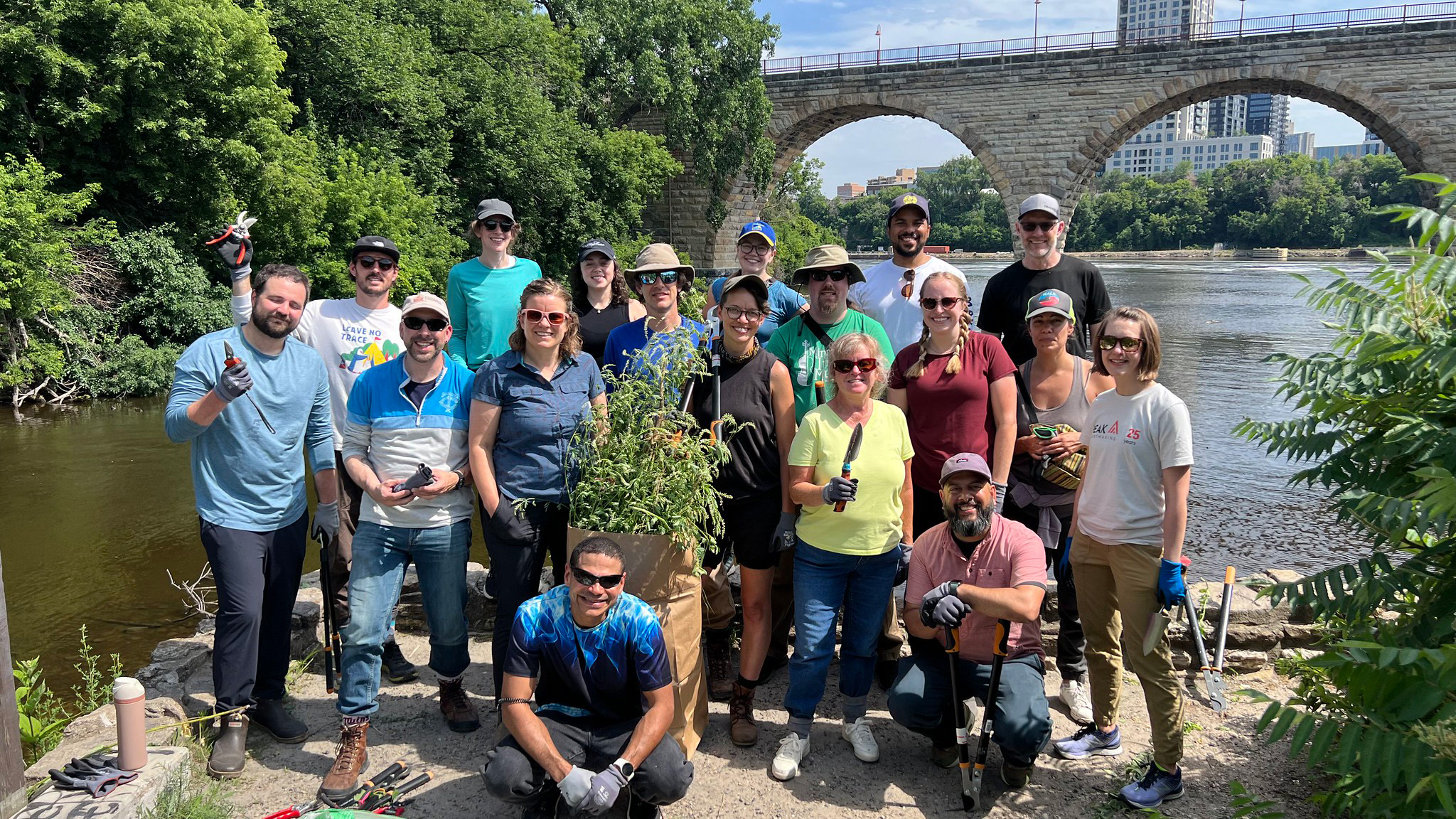 McKnight volunteer group by Stone Arch Bridge