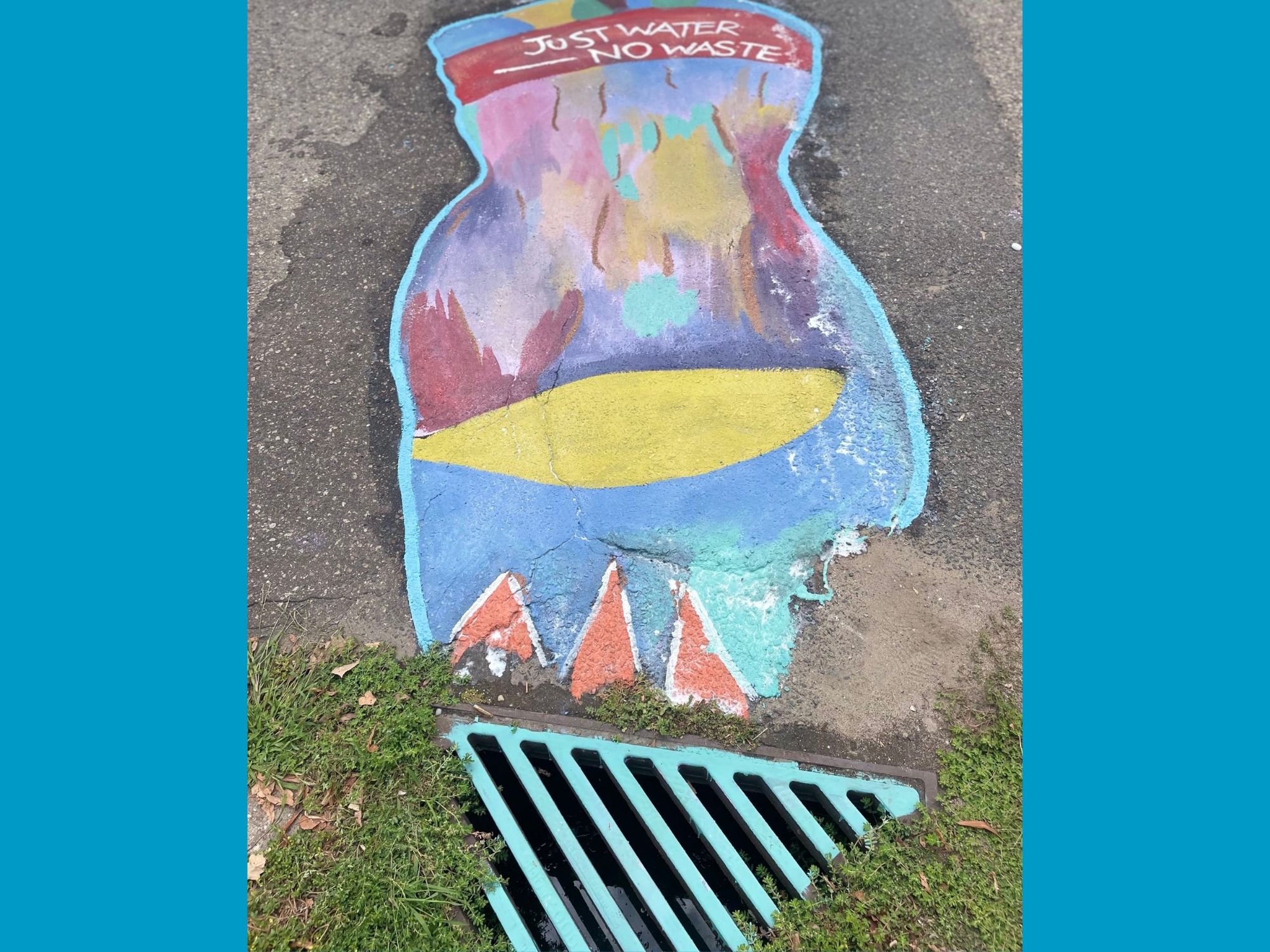 Colorful storm drain mural with text: Just water — no waste 