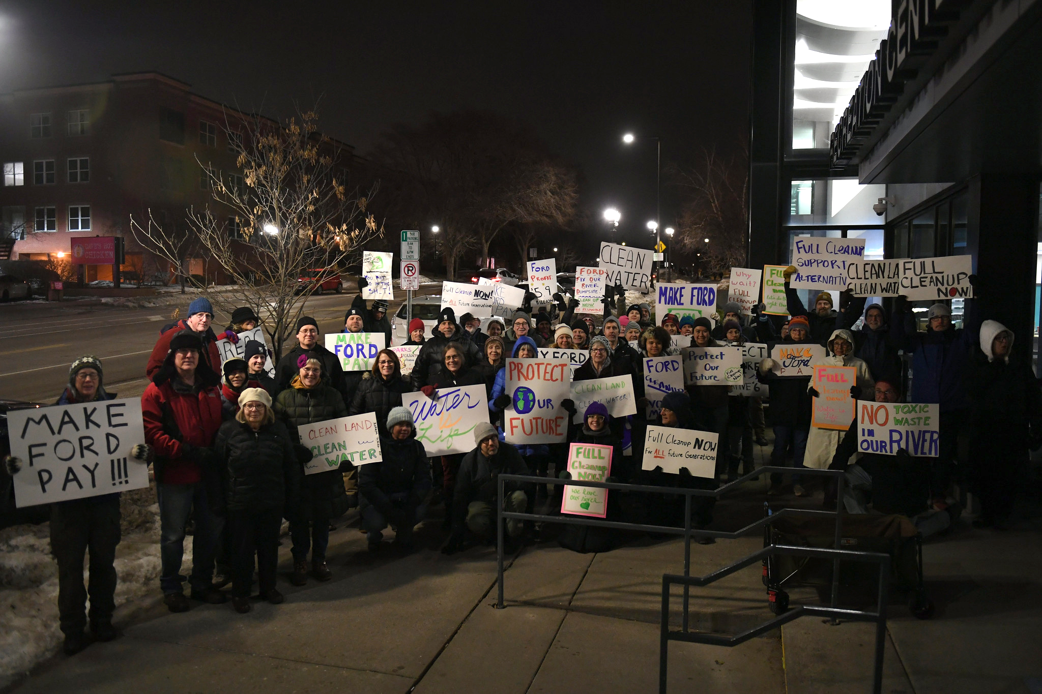 Ford Area C rally group with signs