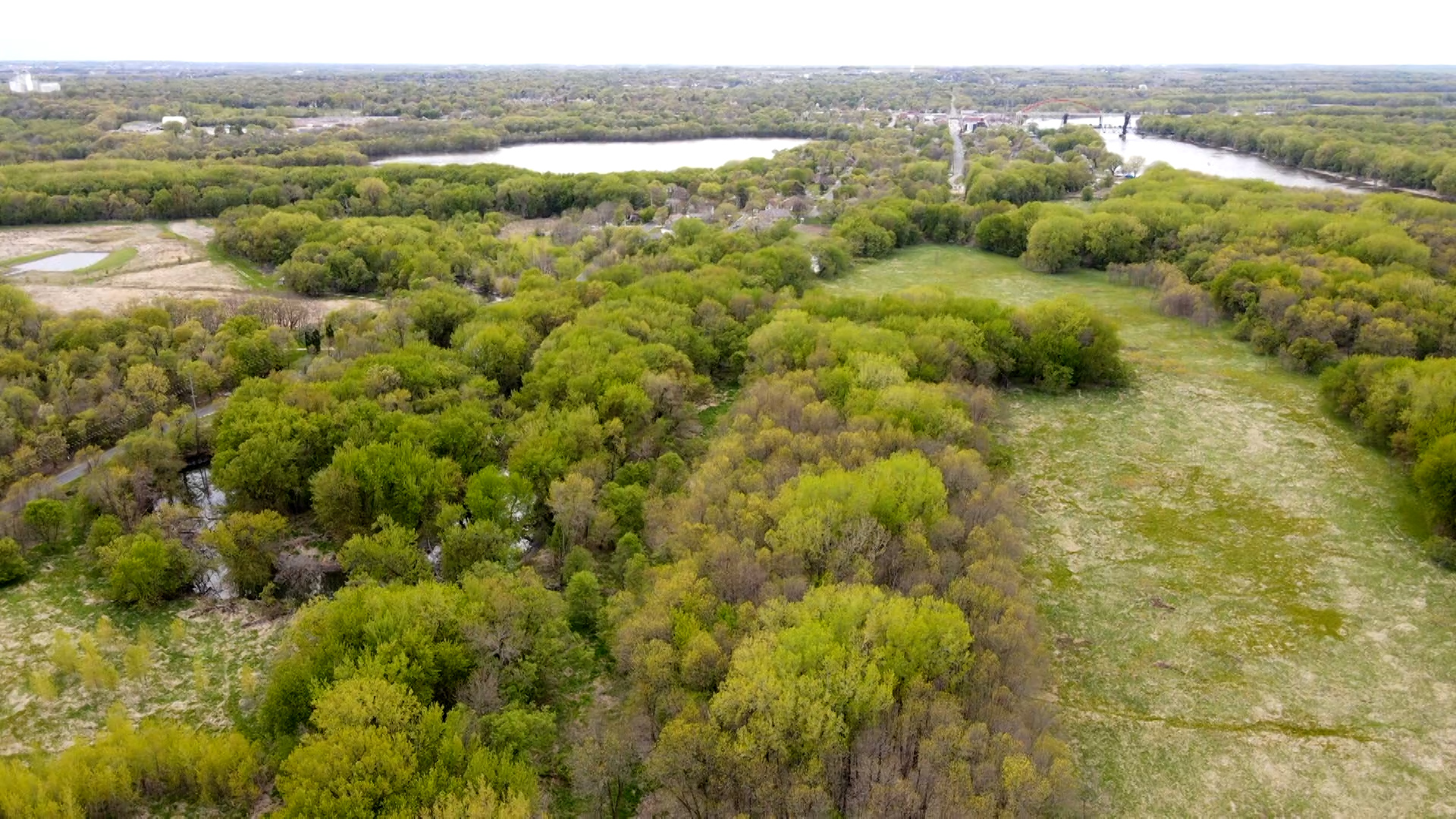Weltands and confluence of rivers with Hastings bridge in background