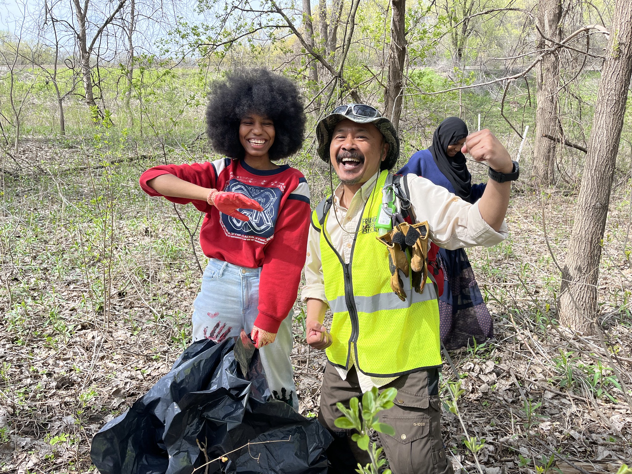 Harding High student and Sovatha with garlic mustard