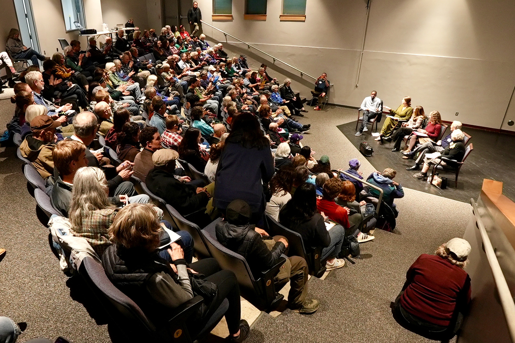 Mayor Carter town hall Packed auditorium with Mayor Carter and speakers on stage