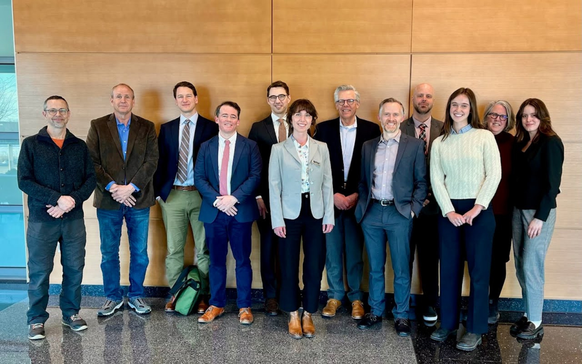 FMR and Forever Green Partnership colleagues together after a hearing.