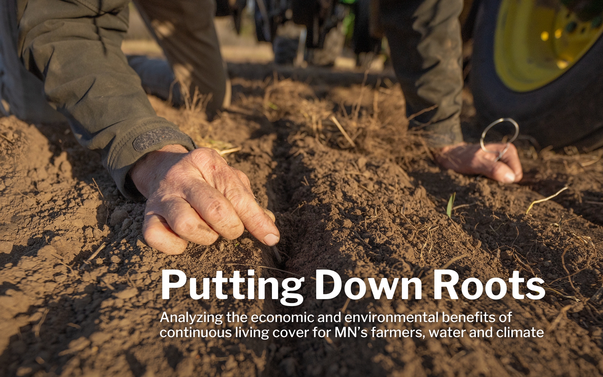 A hand prods at the bare dirt, prepping for a seed planting. Text says "Putting Down Roots: Analyzing the economic and environmental benefits of  continuous living cover for MN’s farmers, water and climate"