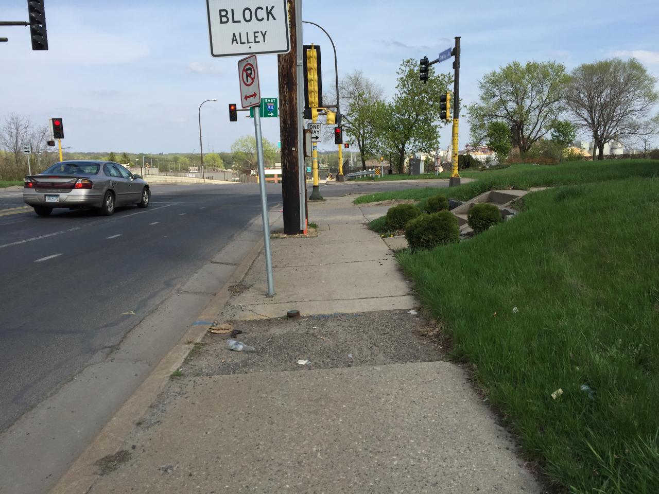 N Dowling Avenue sidewalk three blocks from the river