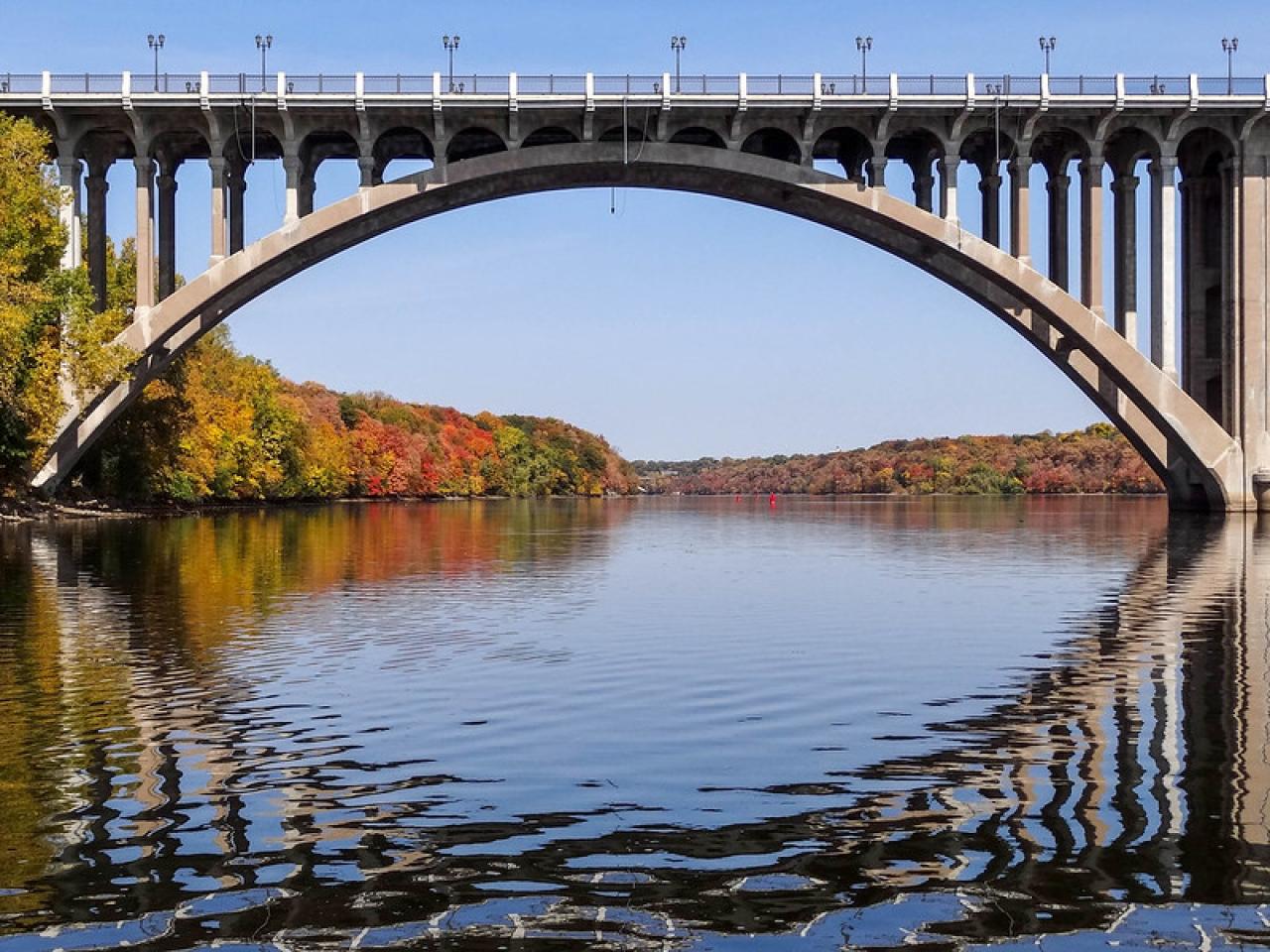 Mississippi River flows below bridge.