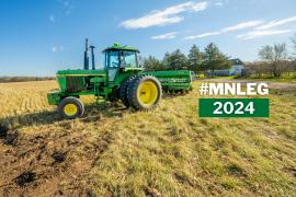 A farmer drives a combine harvester over a field of Kernza. Text over the image says "MNLEG 2024"