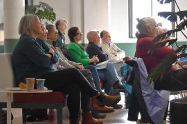 Supporters listen to poetry