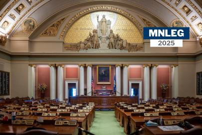 The interior of the Minnesota Senate chambers. Text says "MNLEG25."