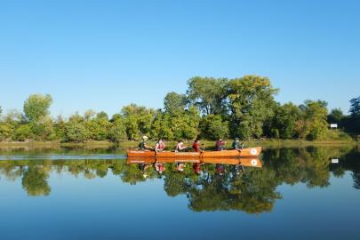 ESI members in canoe on the river