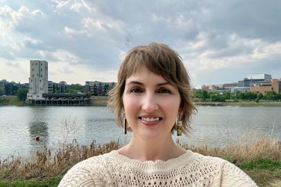 Corrie in front of the Mississippi River at Harriet Island