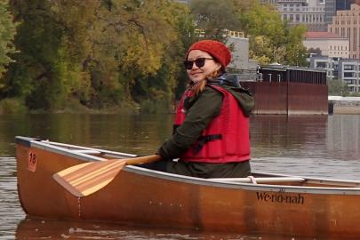 Linda Moua paddling the Mississippi River