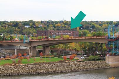 Arrow points to old brick building near the Wabasha Bridge