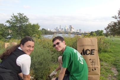Two volunteers tending the prairie at Ole Olson Park in north Minneapolis