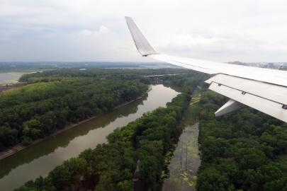 Looking out of an airplane window at Fort Snelling State Park, and the confluence of the Minnesota plus Mississippi rivers. 