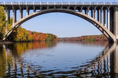 Mississippi River flows below bridge.