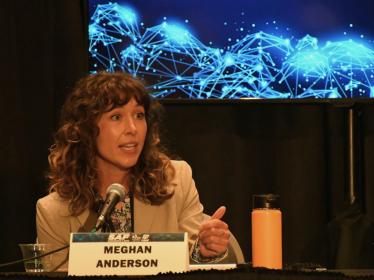 Meghan speaking at the SAF Conference.