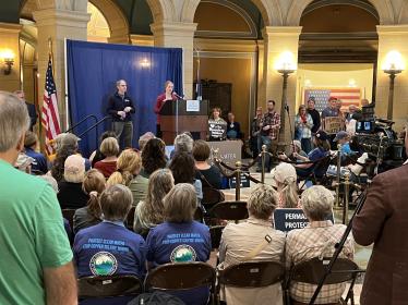 Colleen speaking at Earth Day rally