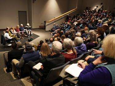Town Hall 2025 Large town hall audience and speakers