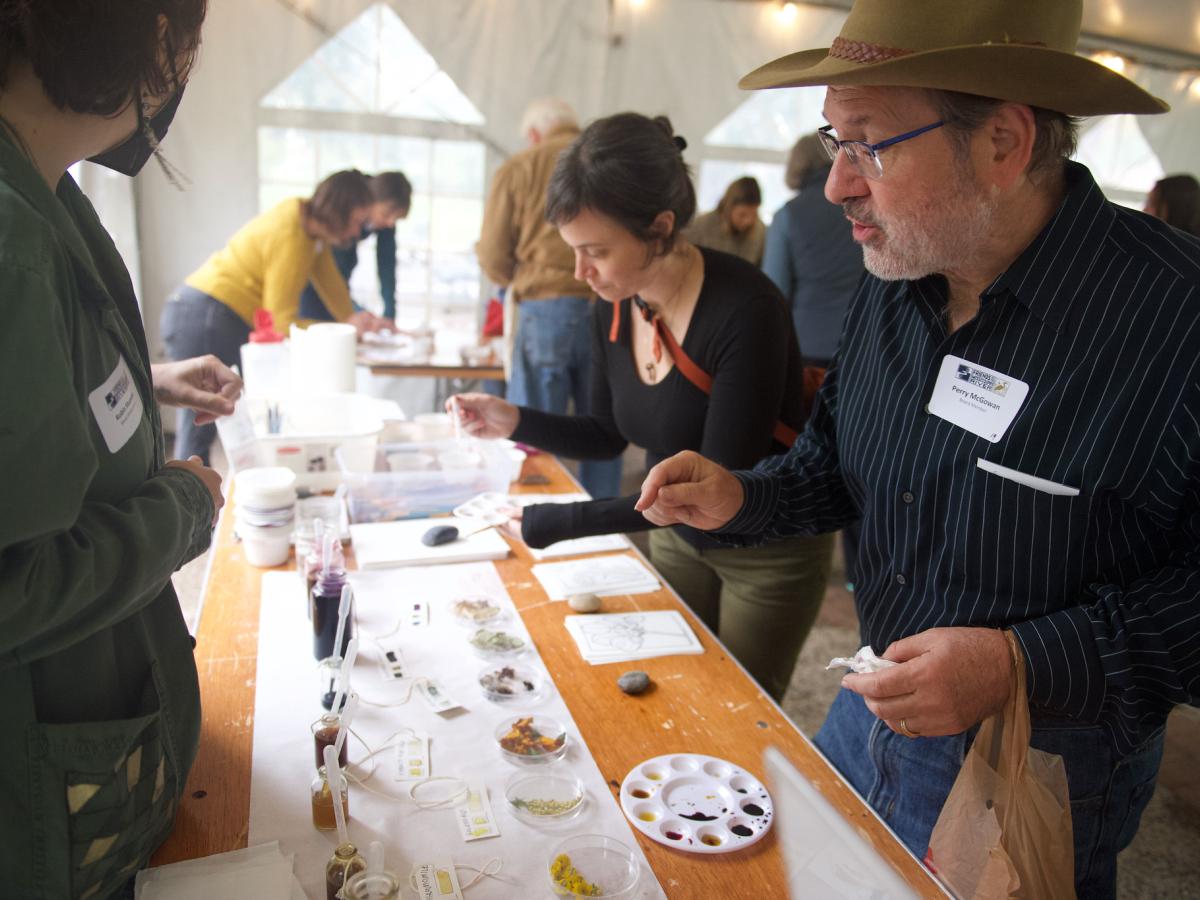 Guests at the art experience table