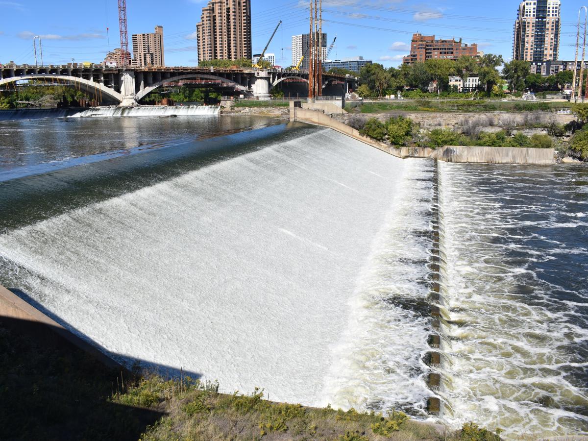 Water flows over Owamniyomni, also known as St. Anthony Falls