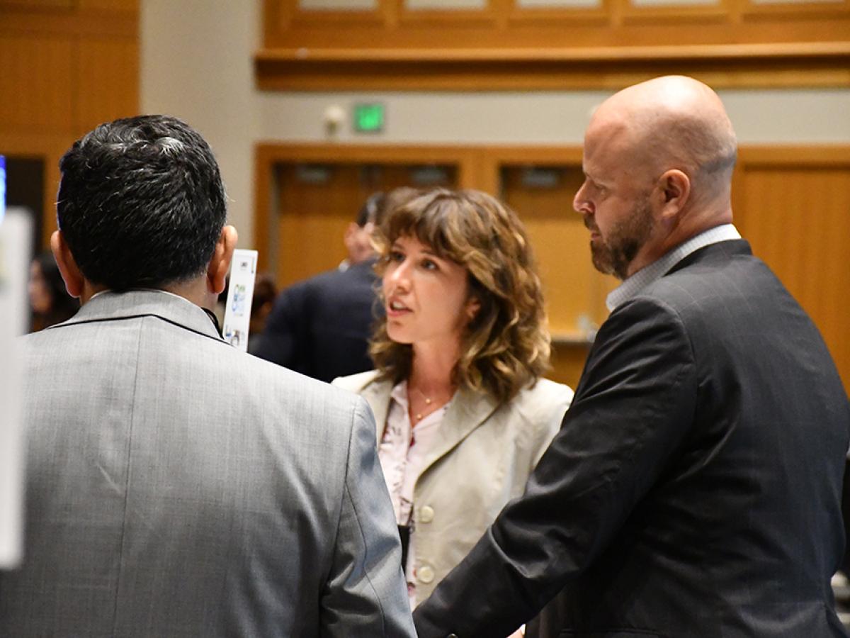 FMR's Meghan Anderson and Trevor Russell speaking to attendees at the SAF Conference.