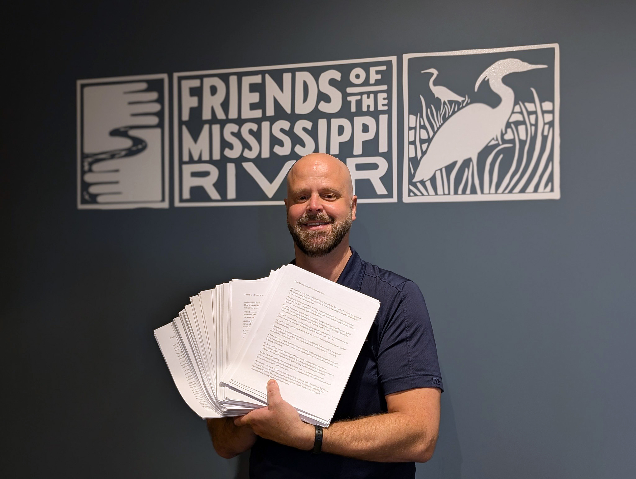 Trevor with 1000 pages of comments printed out