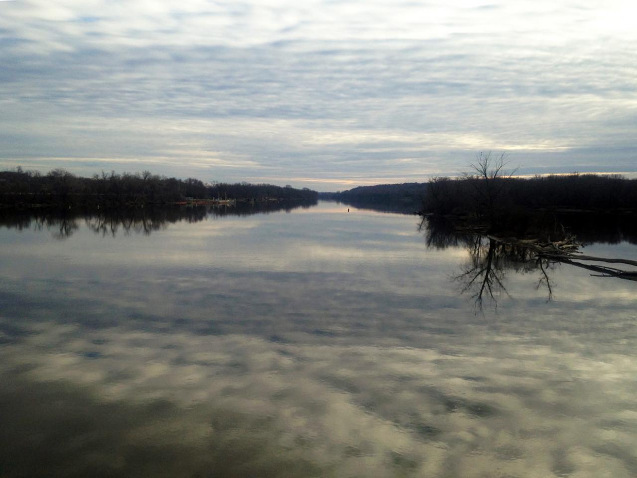 Clouds reflect on river's surface, by Bill Lindeke