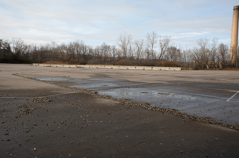 Parking lot looking concrete pad.