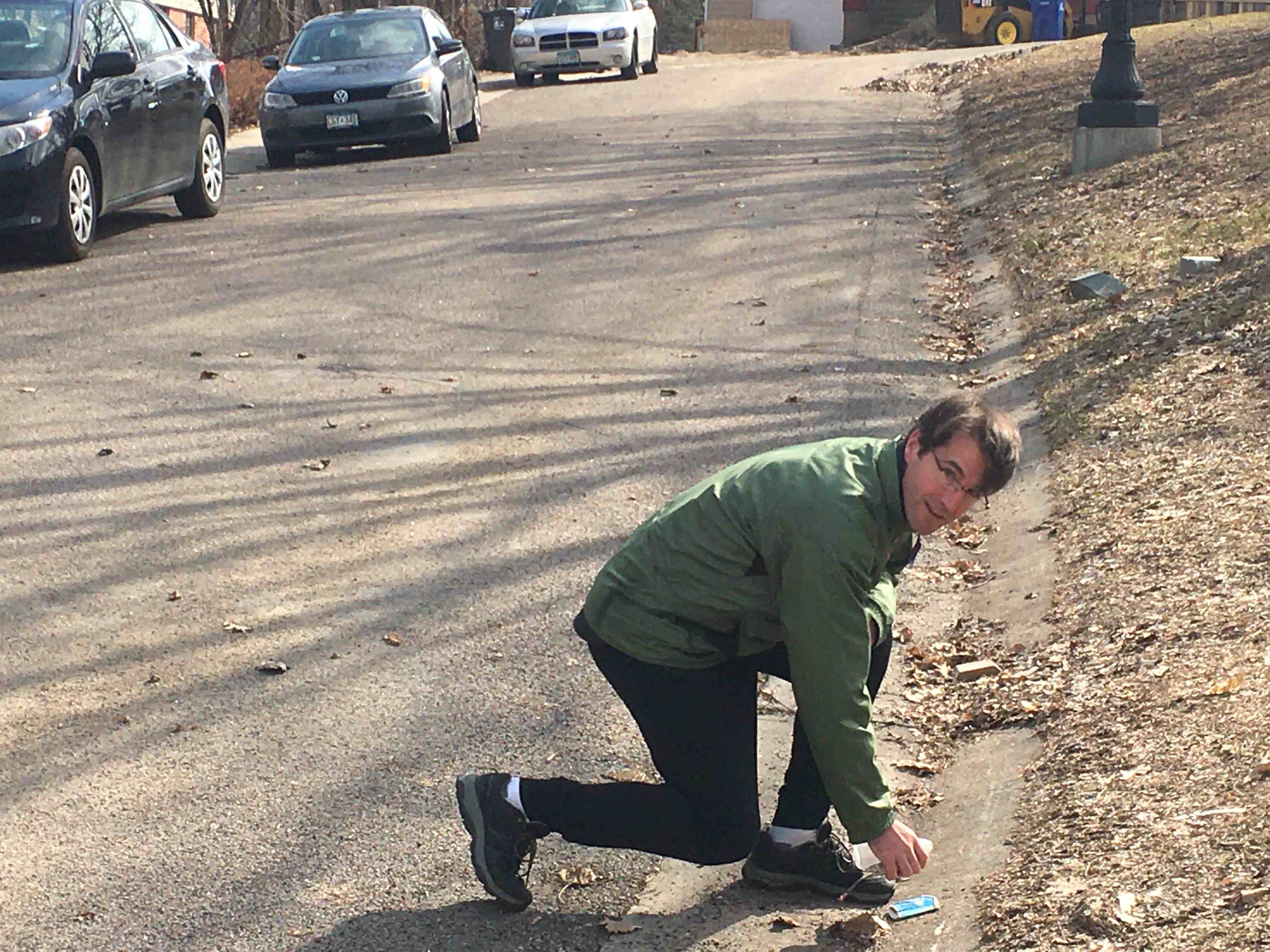 Friend of the river Josh Davis picks up trash on his street