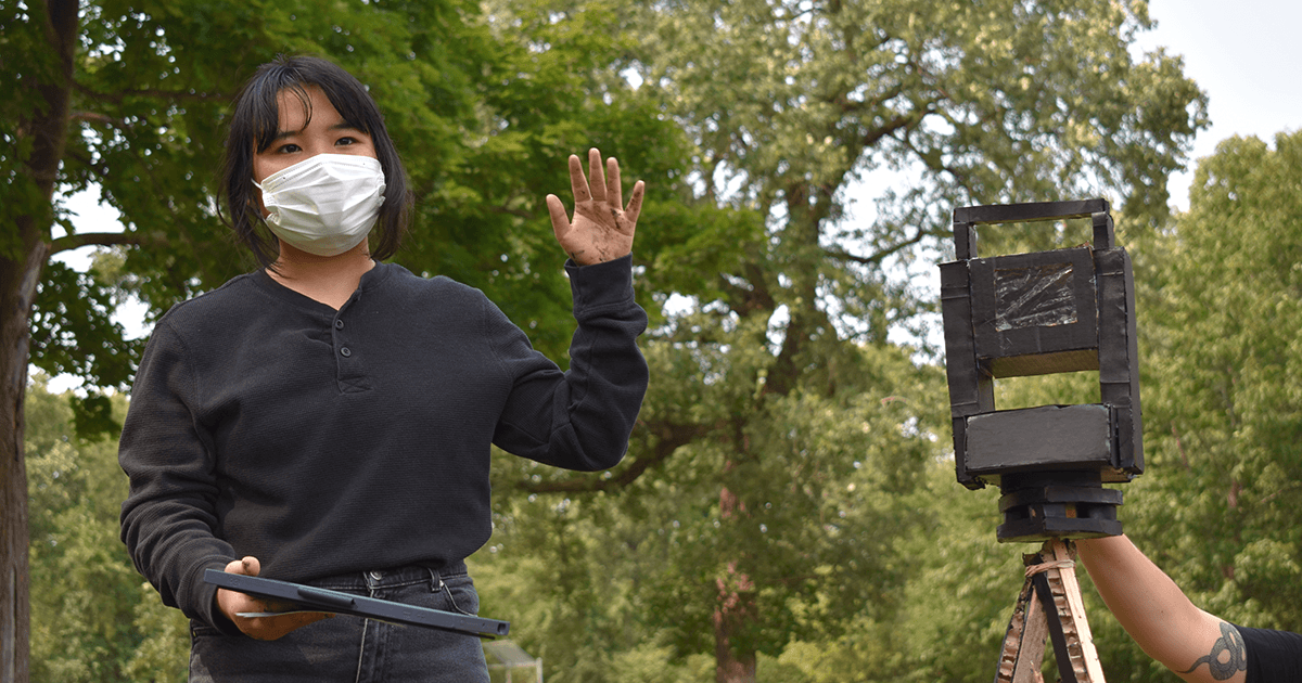 Cho Wah with her art piece