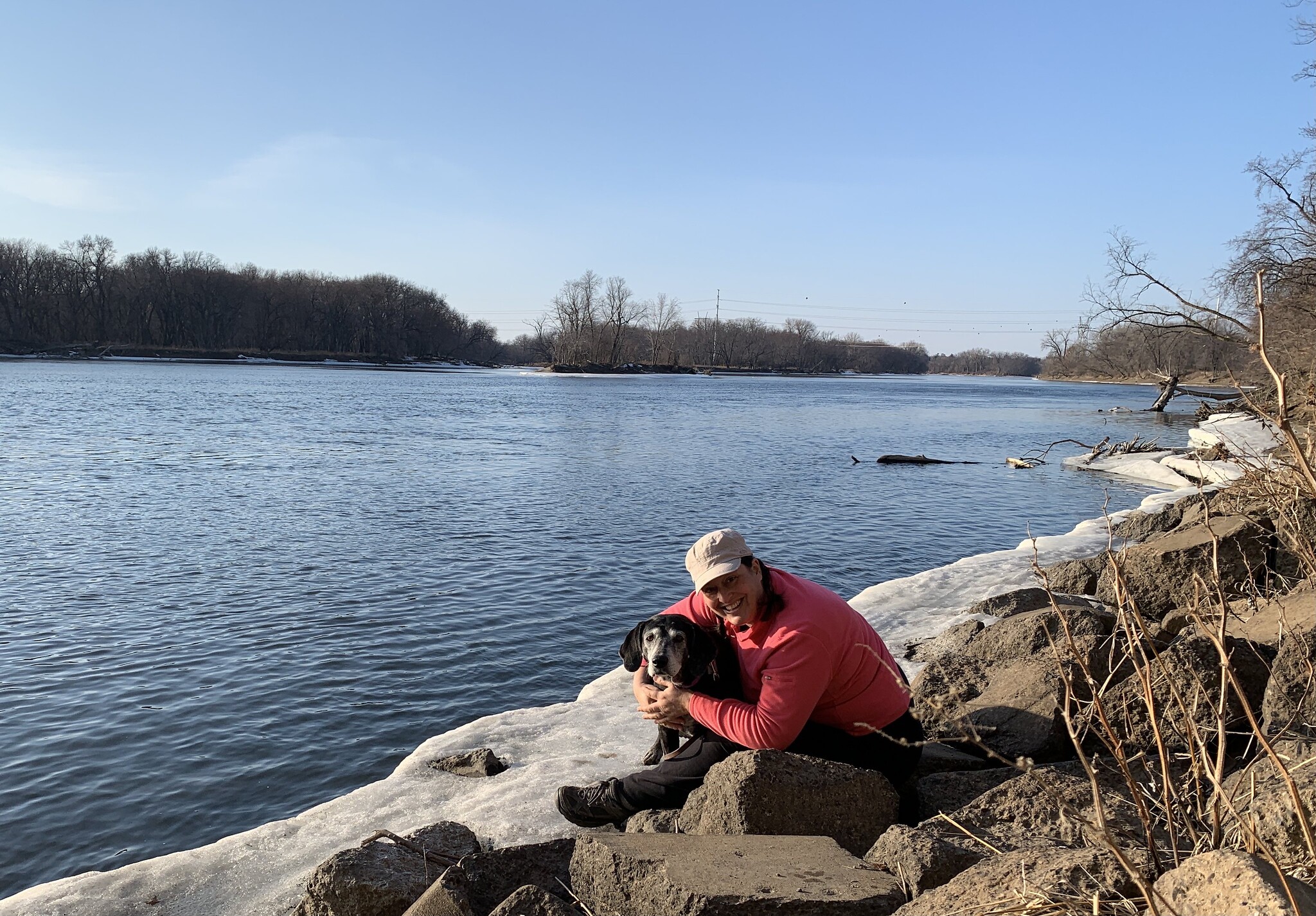 Jen with dog at the river