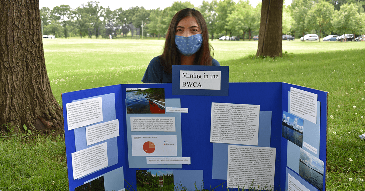 Justine with poster