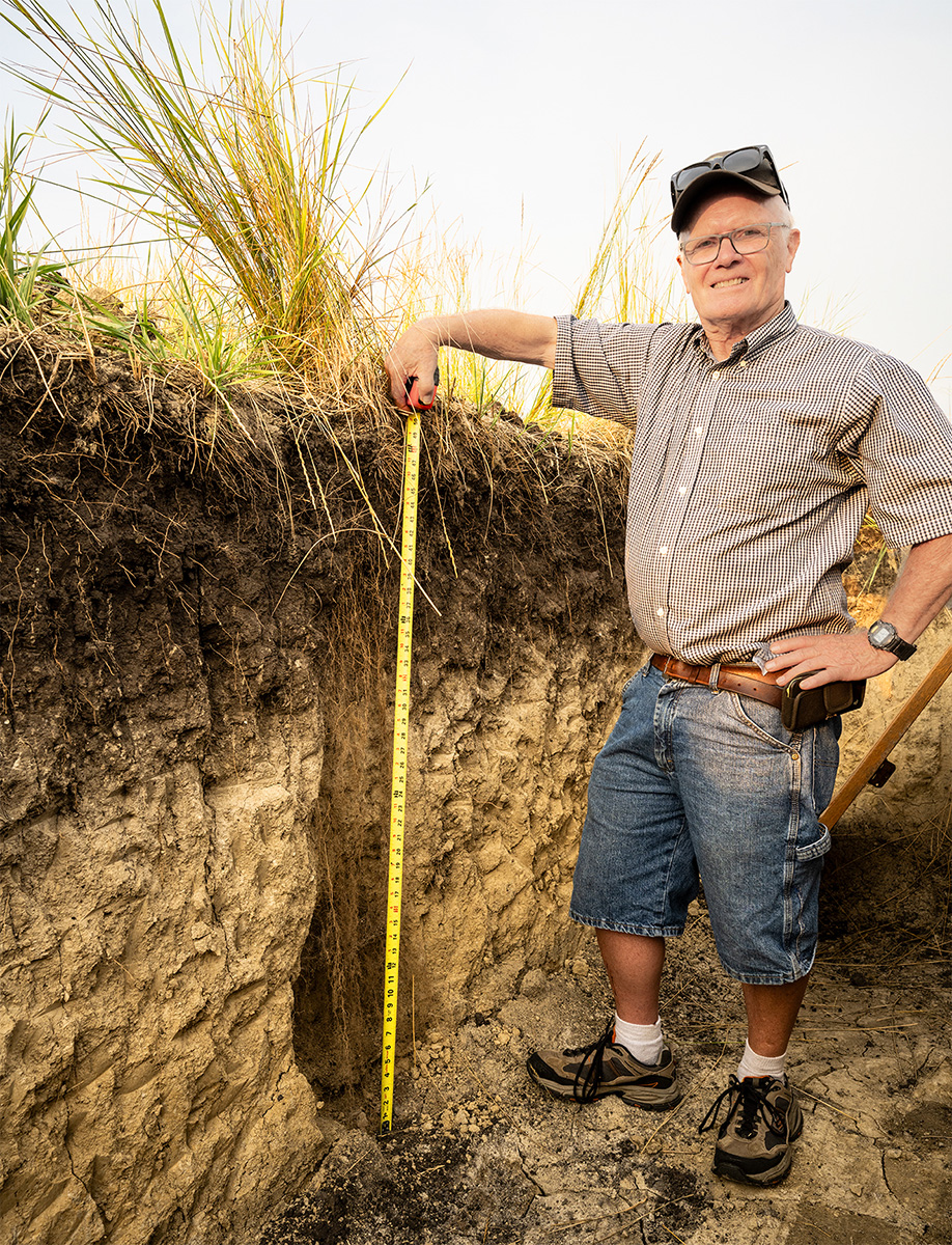 Farmer with Kernza roots