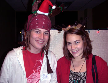 [Photo: Joe and Anna celebrate at FMRs holiday open house.]