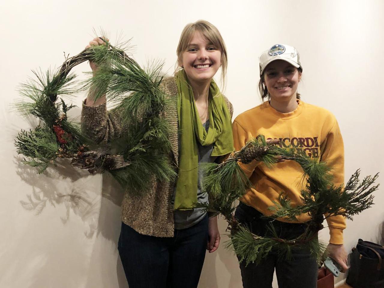 Event participants with buckthorn wreaths