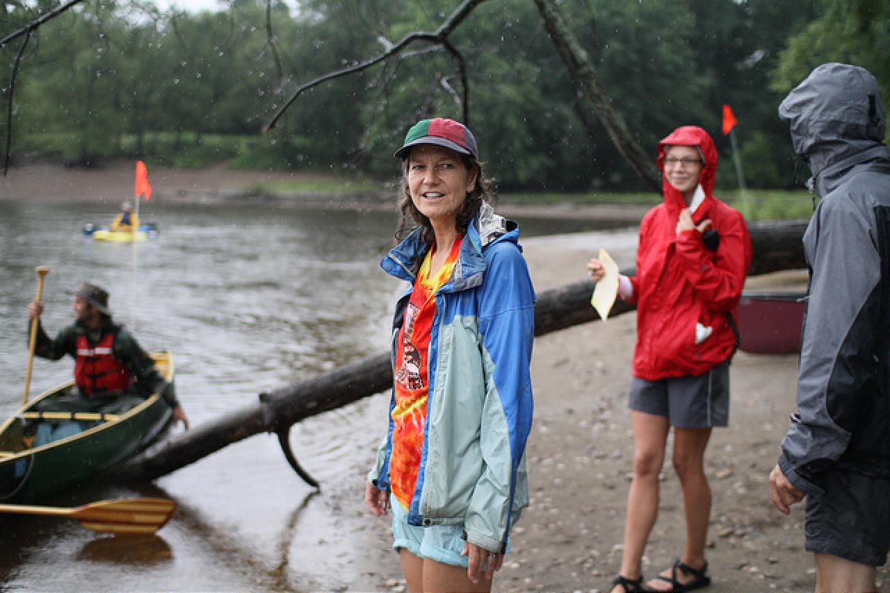 Michele Bevis ready to help a paddler come in off the river at an FMR event.