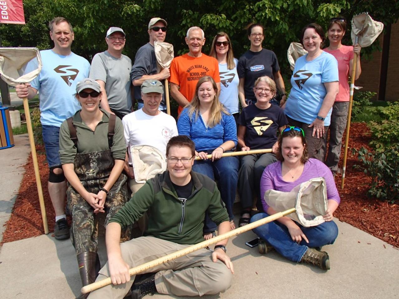 A past SHEP team poses with their sampling nets A past SHEP team poses with their sampling nets